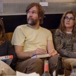 Quiz Participants Looking Towards Screen