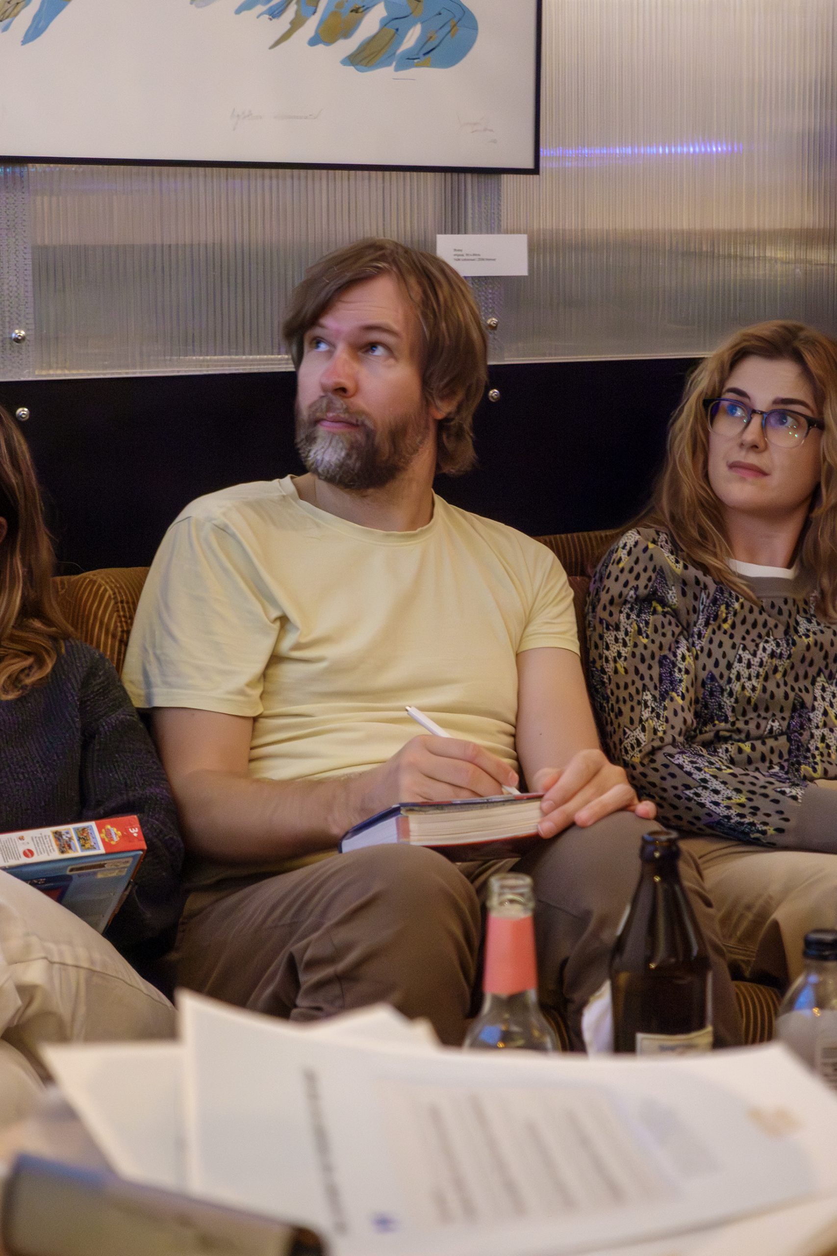 Quiz Participants Looking Towards Screen